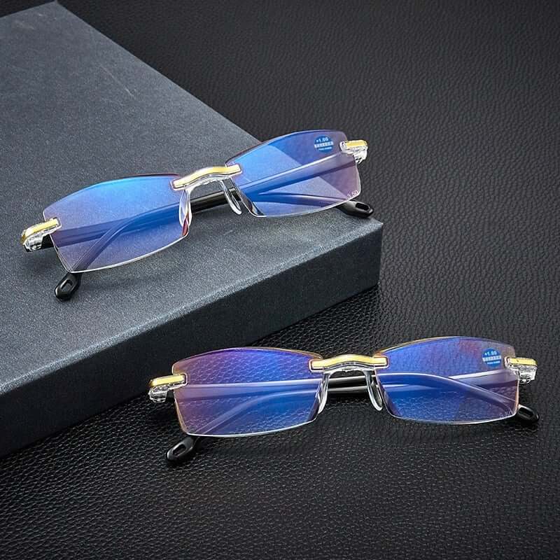 gafas visión continua Optilux TR90 en colores azul y transparente sobre fondo negro